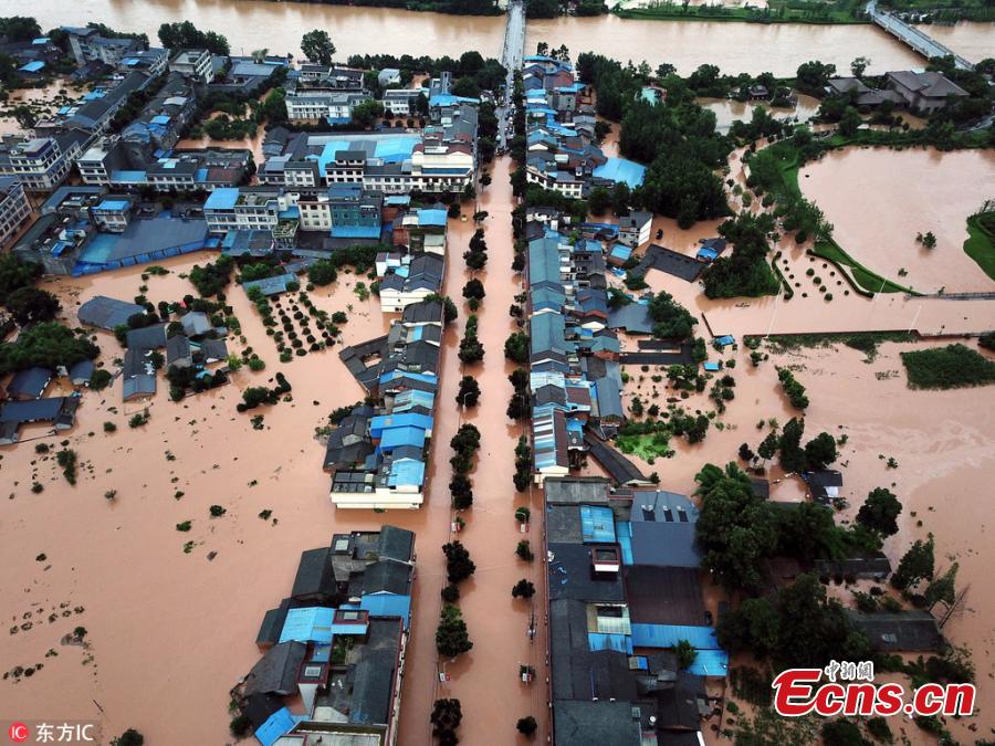 <?php echo strip_tags(addslashes(An aerial view of flooded areas in Shouan Town, Pujiang County, Southwest China’s Sichuan Province, July 2, 2018, after a rainstorm. (Photo/IC))) ?>