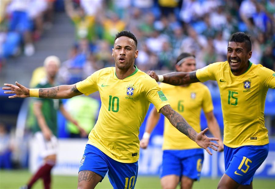 Neymar (L) of Brazil celebrates scoring with Paulinho during the 2018 FIFA World Cup round of 16 match between Brazil and Mexico in Samara, Russia, July 2, 2018. (Xinhua/Chen Yichen)
