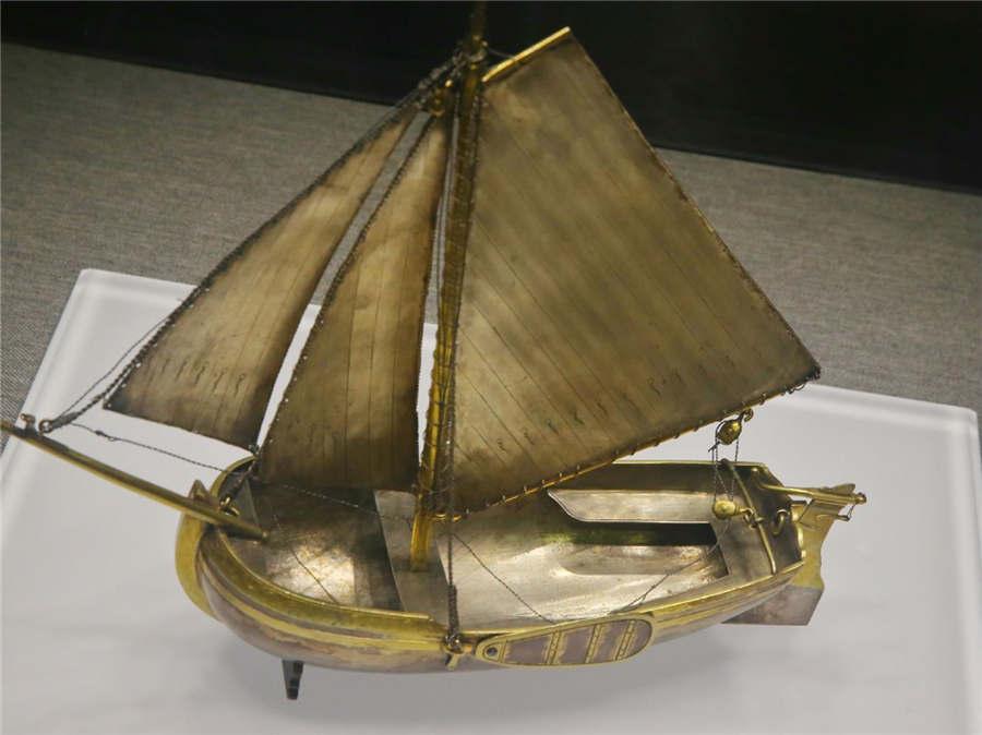 A gilded silver boat model once belonged to Peter the First.  (Photo/China Daily)