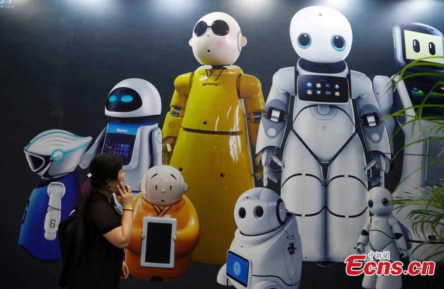 Robots on display at the CIROS2018 (China International Robot Show) in Shanghai, July 4, 2018. More than 500 companies from 13 countries and regions showcased various robot products and services. (Photo: China News Service/Tang Yanjun)