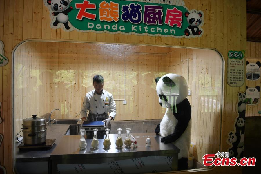 Keepers prepare food for giant pandas at the Yunnan Wildlife Park in Kunming City, Southwest China’s Yunnan Province, July 3, 2018. The park has opened a panda kitchen where visitors can see how keepers prepare food for the animals and also participate in the preparation process in the future. (Photo: China News Service/Liu Ranyang)