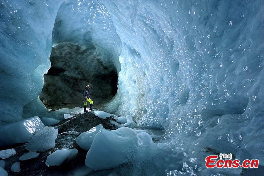British adventure photographer Robbie Shone descended into the Gorner Glacier near Zermatt in Switzerland to capture spectacular pictures of ice caves.(Photo/IC)