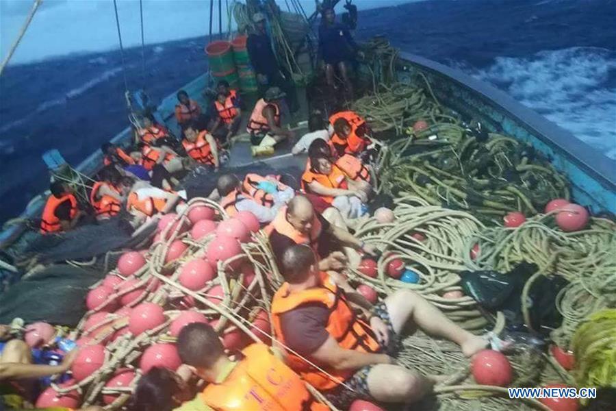 Rescued tourists are seen on a boat near the island of Phuket, Thailand, July 5, 2018. Until 8:30 p.m. local time (1330 GMT) Thursday, the majority of 133 passengers on two boats overturned by rough seas in southern Thailand were saved, but the Thai authority cannot confirm all of them are saved now, said Chinese Consulate-General in Songkhla on Thursday.(Xinhua)