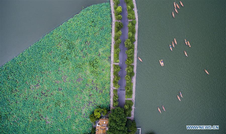 <?php echo strip_tags(addslashes(Aerial photo taken on July 6, 2018 shows the summer scenery of the West Lake in Hangzhou, east China's Zhejiang Province. (Xinhua/Xu Yu))) ?>