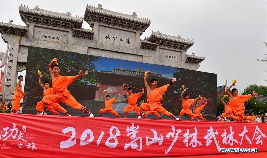 Performers stage a martial arts performance at Shaolin Temple on the Mount Songshan, central China\'s Henan Province, July 7, 2018. (Xinhua/Li Jianan)