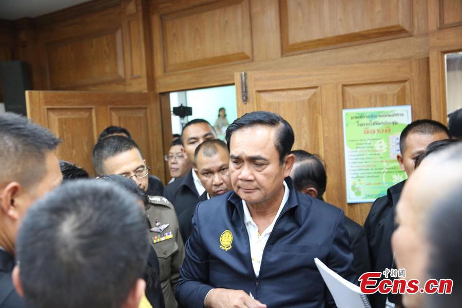 Thai Prime Minister Prayut Chan-o-cha visits the command center for rescue operations in the Phuket boat accident, at Chalong Pier in the tourist attraction island of Phuket, July 9, 2018.  He later visited Chinese survivors in local hospitals, expressed his condolence to the victims and pledged to make all-out rescue efforts. (Photo: China News Service/Wang Gang)