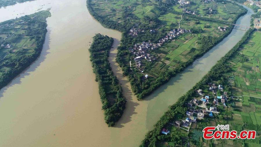 <?php echo strip_tags(addslashes(An aerial view of muddy water mixing with clean after strong rainfall in Rong’an County, South China’s Guangxi Zhuang Autonomous Region, July 10, 2018. (Photo: China News Service/Tan Kaixing))) ?>
