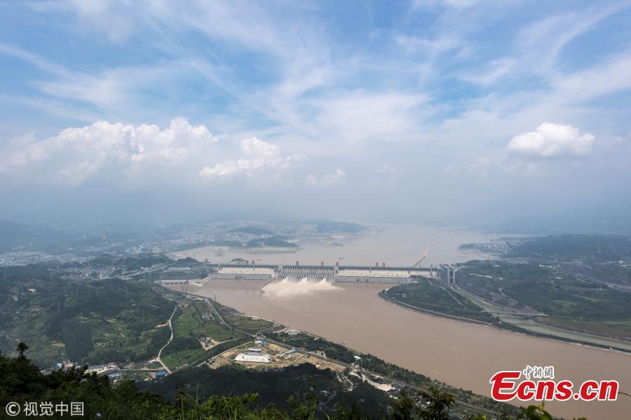 <?php echo strip_tags(addslashes(Water gushes out of the Three Gorges Dam in Yichang City, Central China’s Hubei Province. On July 14, the Three Gorges Reservoir will receive a massive 60, 000 cubic meters of water a second due to heavy rain in the upper reaches of the Yangtze River. Authorities have issued a flood alert in several provinces along the river. (Photo/VCG))) ?>