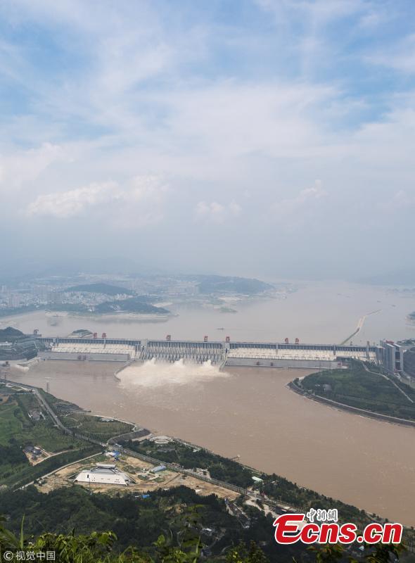 <?php echo strip_tags(addslashes(Water gushes out of the Three Gorges Dam in Yichang City, Central China’s Hubei Province. On July 14, the Three Gorges Reservoir will receive a massive 60, 000 cubic meters of water a second due to heavy rain in the upper reaches of the Yangtze River. Authorities have issued a flood alert in several provinces along the river. (Photo/VCG))) ?>