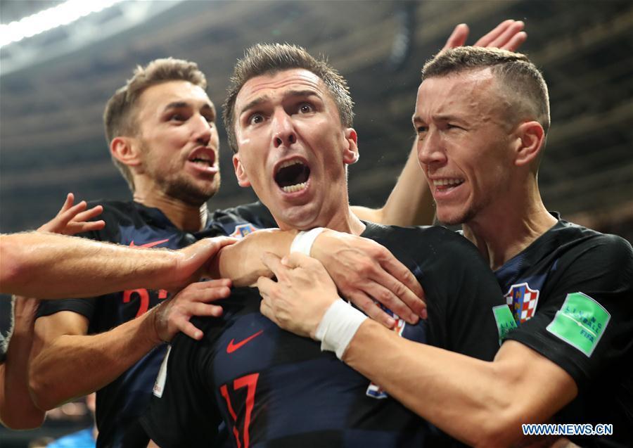 Mario Mandzukic (C) of Croatia celebrates scoring with teammates during the 2018 FIFA World Cup semi-final match between England and Croatia in Moscow, Russia, July 11, 2018. (Xinhua/Cao Can)
