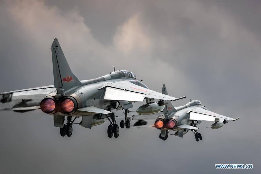 <?php echo strip_tags(addslashes(Two PLA air force JH-7A fighter-bombers are seen during a training module in preparation for the International Army Games on July 12, 2018. The Chinese People's Liberation Army (PLA) air force will send H-6K bombers, J-10A fighters, JH-7A fighter-bombers, IL-76 and Y-9 transport aircrafts, and a team of airborne troops to Russia to participate in the International Army Games 2018. It will be the first time that H-6K bombers and Y-9 transport aircraft have gone abroad to take part in military competitions.(Xinhua/Yang Pan))) ?>