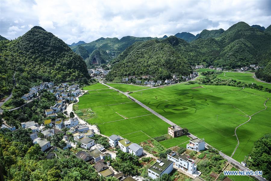 Photo taken on July 15, 2018 shows karst hills within the Wanfenglin scenic area in Xingyi, southwest China\'s Guizhou Province. (Xinhua/Tao Liang)