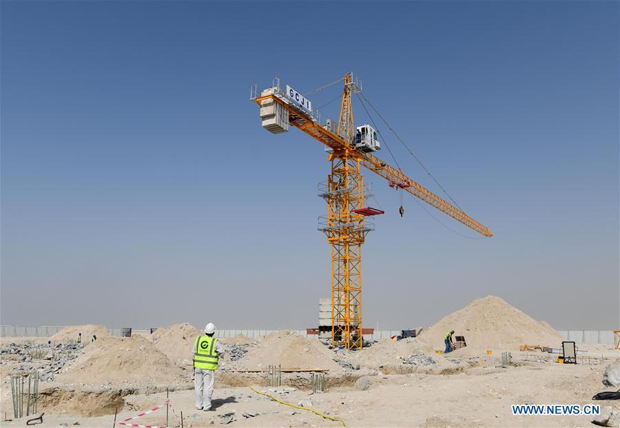 <?php echo strip_tags(addslashes(Constructors work at the construction site of the China-UAE Industrial Capacity Cooperation Demonstration Zone, in Abu Dhabi, the United Arab Emirates (UAE), on July 16, 2018. The China-UAE Industrial Capacity Cooperation Demonstration Zone is located in the Khalifa Industrial Zone and covers an area of 2.2 square kilometers, with the main layout of new energy, aluminium products processing, business logistics, petrochemical, food processing and other industries. (Xinhua/Wu Huiwo))) ?>