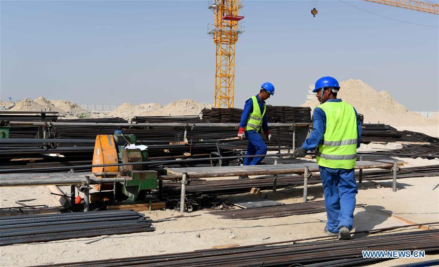 <?php echo strip_tags(addslashes(Constructors work at the construction site of the China-UAE Industrial Capacity Cooperation Demonstration Zone, in Abu Dhabi, the United Arab Emirates (UAE), on July 16, 2018. The China-UAE Industrial Capacity Cooperation Demonstration Zone is located in the Khalifa Industrial Zone and covers an area of 2.2 square kilometers, with the main layout of new energy, aluminium products processing, business logistics, petrochemical, food processing and other industries. (Xinhua/Wu Huiwo))) ?>