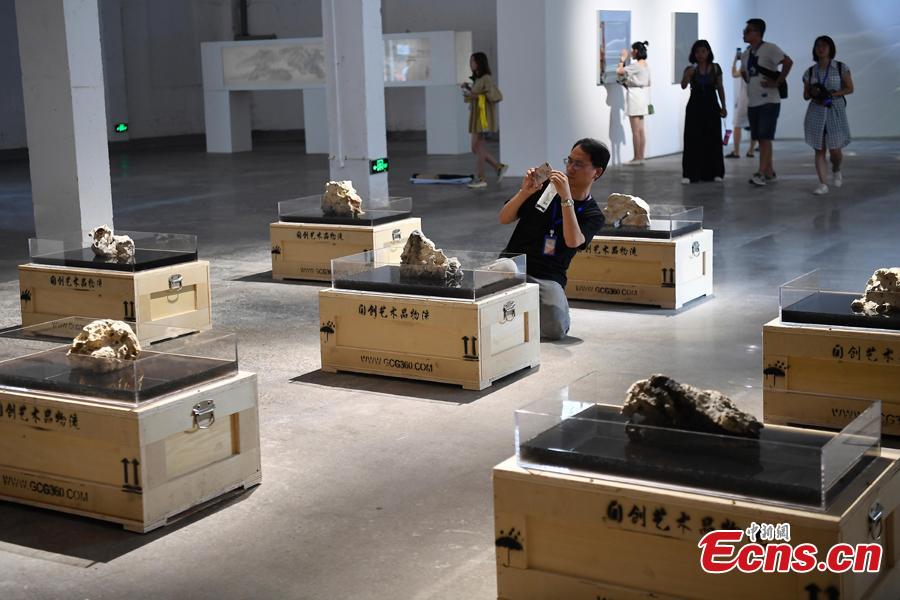 Photo taken on July 19, 2018 shows an international sculpture festival in Pingyao County, North China’s Shanxi Province. More than 40 artists brought their sculpture works to the festival in the ancient town.(Photo: China News Service/Wei Liang)