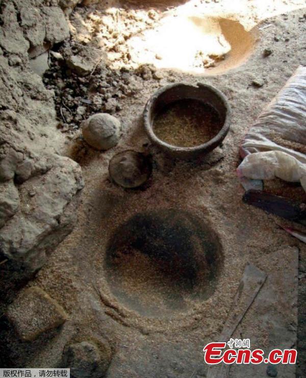 This photo released on July 19, 2018, by the Egyptian Antiquities ministry shows the oldest workshop for the pottery industry of the old state discovered by a mission working in the groundwater reduction project in the Temple of Kom Ombo in Aswan, Egypt. The pottery workshop was built during the Fourth Dynasty of ancient Egypt (between 2613 and 2494 BC).This rare discovery provided a glimpse into daily life millenia ago.(Photo/Agenceis)