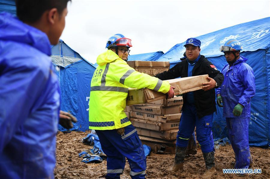 <?php echo strip_tags(addslashes(Rescuers convey disaster relief materials at flood-hit Chenhe Village of Dongxiang Autonomous County in Linxia Hui Autonomous Prefecture, northwest China's Gansu Province, July 20, 2018. About 1.08 million people in Gansu Province were affected by rain-triggered floods, with 12 deaths, four people missing and 27,000 people evacuated. (Xinhua/Chen Bin))) ?>