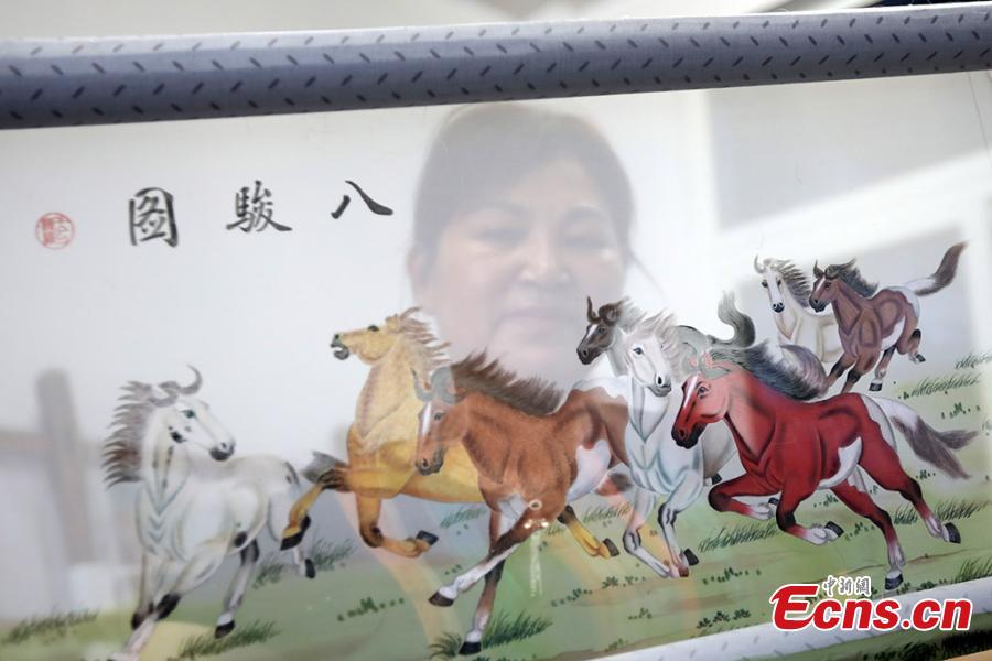 A piece of hair embroidery work in Dongtai Yancheng City of Jiangsu Province, July 22, 2018. Hair embroidery refers to a style of embroidery that uses human hair as thread instead of other materials. According to historical records, hair embroidery originated in Dongtai more than 1,300 years ago. Hair embroidery designs are vivid and varied, involving living creatures, plants, landscapes and historical figures. The art is now included in the provincial-level intangible cultural heritage list. (Photo: China News Service/Yang Bo)