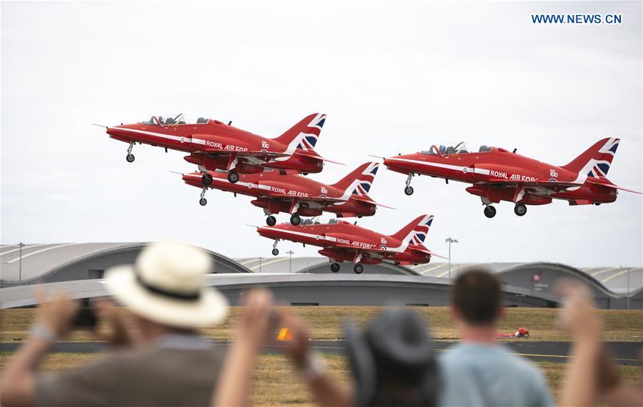 <?php echo strip_tags(addslashes(The Red Arrows perform a flypast at the Farnborough International Airshow, south west of London, Britain on July 22, 2018. (Xinhua/Han Yan))) ?>