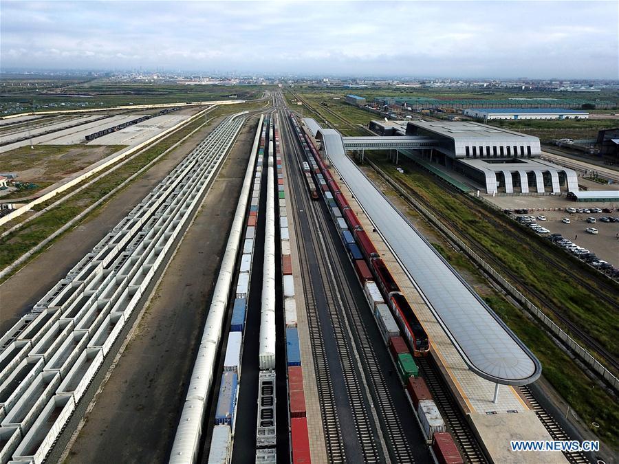 <?php echo strip_tags(addslashes(Aerial photo taken on June 3, 2018 shows trains stop at the Nairobi railway station in Nairobi, capital of Kenya. In the past five years, China and African nations have deepened political mutual trust, mutual assistance in development and mutual learning in visions, and made concerted efforts in building the Belt and Road and a closer China-Africa community with a shared future. (Photo/Xinhua))) ?>