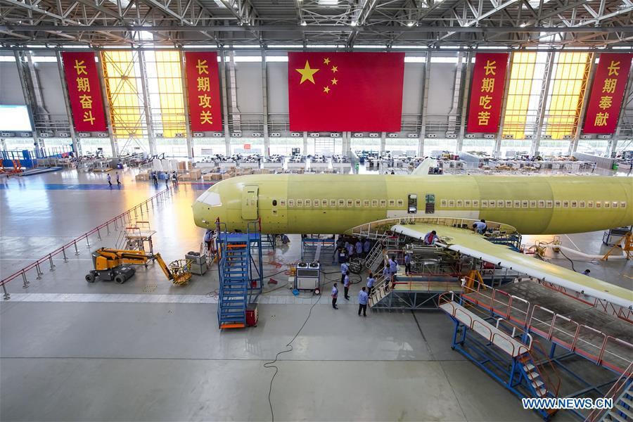 Photo taken on July 5, 2018 shows the assembly line of C919 plane in east China\'s Shanghai. This year marks the 40th anniversary of China\'s reform and opening-up policy. (Xinhua/Shen Bohan)
