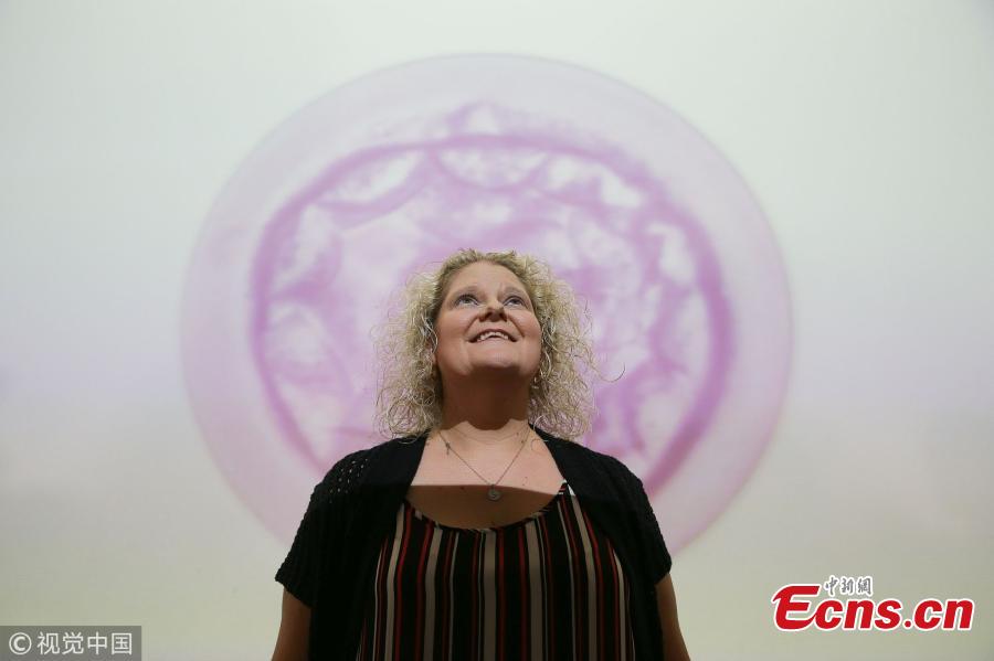 Louise Brown poses for photographs following a press conference to mark her approaching fortieth birthday, at the Science Museum on July 23, 2018 in London, England. On 25th July 1978, Louise Brown became the first baby to be born using the In Vitro Fertilisation technique pioneered by British researchers Robert Edwards, Patrick Steptoe and Jean Purdy. The Science Museum in London is holding an exhibition entitled IVF: 6 Million Babies Later to celebrate the success of IVF. (Photo/VCG)