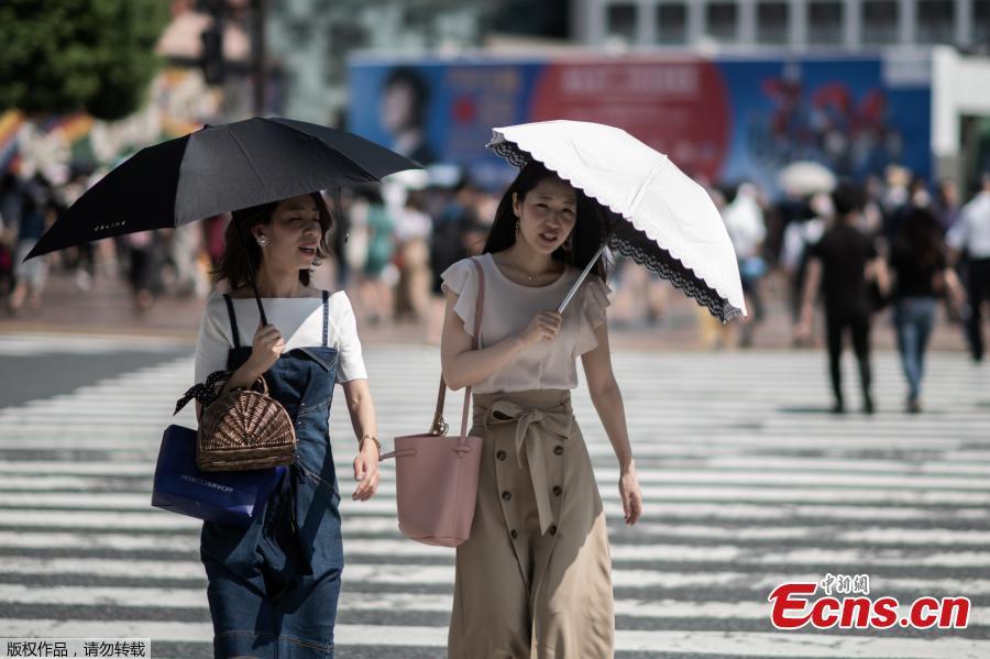 The temperature rose to a record 41.1 Celsius (106 Fahrenheit) in a city northwest of Tokyo on Monday, as a heat wave in Japan that has killed at least 23 people and sent thousands to hospital showed no sign of significant easing. (Photo/Agencies)