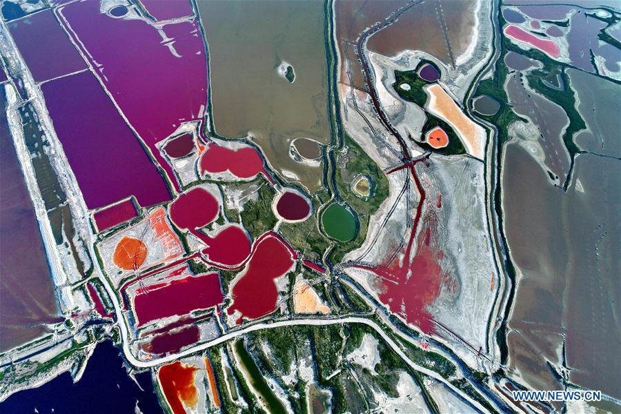 <?php echo strip_tags(addslashes(Aerial photo taken on July 24, 2018 shows the colorful Salt Lake in Yuncheng City, north China's Shanxi Province. The lake has different colors as the water density changes. (Xinhua/Xue Jun))) ?>