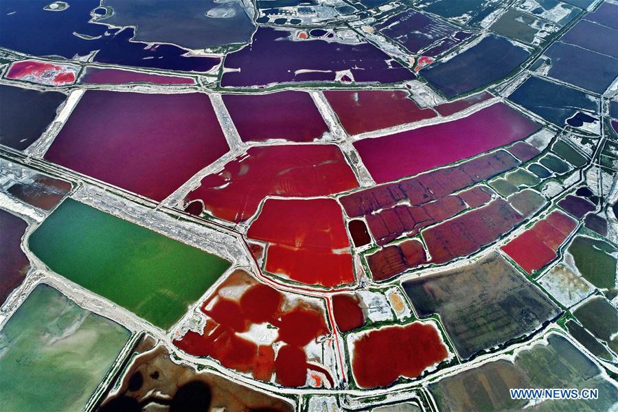 <?php echo strip_tags(addslashes(Aerial photo taken on July 24, 2018 shows the colorful Salt Lake in Yuncheng City, north China's Shanxi Province. The lake has different colors as the water density changes. (Xinhua/Xue Jun))) ?>