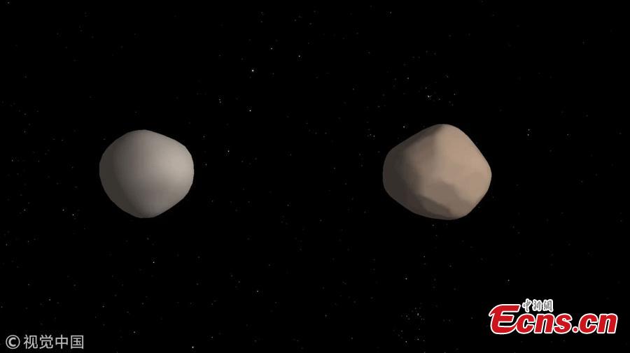 Artist\'s concept of what binary asteroid 2017 YE5 might look like.(Photo/VCG)