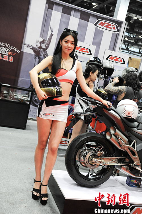 Photo taken on July 28- 29, 2018 shows a motorcycle exhibition held at the China National Convention Center in Beijing. Organized by an online auto platform, the fair displayed hundreds of motorcycles from home and abroad, such as the Ducati 959 sport bike, vintage Changjiang 650 sidecar, the Harley-Davidson WLA produced to the U.S. Army during the World War II and Benelli Leoncino bike. (Photo: China News Service/Fu Yu)