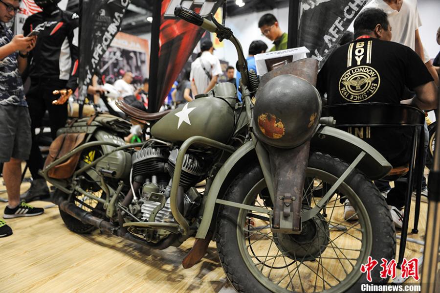 Photo taken on July 28- 29, 2018 shows a motorcycle exhibition held at the China National Convention Center in Beijing. Organized by an online auto platform, the fair displayed hundreds of motorcycles from home and abroad, such as the Ducati 959 sport bike, vintage Changjiang 650 sidecar, the Harley-Davidson WLA produced to the U.S. Army during the World War II and Benelli Leoncino bike. (Photo: China News Service/Fu Yu)