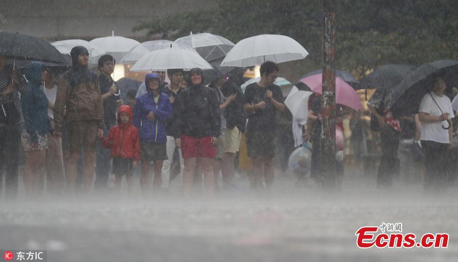 Typhoon Jongdari, packing winds of up to 180 kilometres an hour, made landfall at Ise in the Mie prefecture at around 1 am Saturday, according to the nation’s meteorological agency.(Photo/IC)