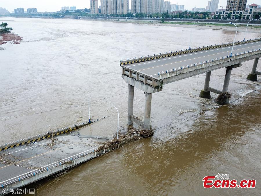 The Mingjiang River First Bridge collapses in Meishan City, Southwest China’s Sichuan Province, July 27, 2018. The bridge collapsed 28 minutes after police stopped traffic from crossing it. The bridge opened to traffic in May 1994. No one was injured in the incident. (Photo/VCG)