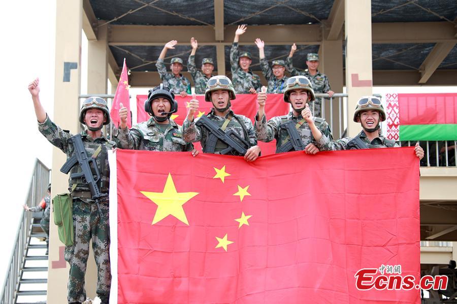 <?php echo strip_tags(addslashes(Chinese soldiers pose for a photo during the “Clear Sky” contest at the International Army Games 2018 in Korla in Xinjiang Uygur Autonomous Region, July 31, 2018. China beat six other teams to win the contest. Three of the tournament events - 