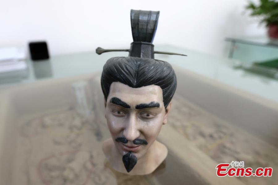 A head sculpture of a man from the Qin Dynasty (221 to 206 BC) made using 3D-printing technology in Northwest University in Xi’an City, Shaanxi Province, Aug. 2, 2018. Through \