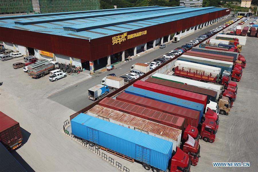 <?php echo strip_tags(addslashes(Aerial photo taken on Aug. 1, 2018 shows the parking lot of Truck Alliance, China's Uber-type service for trucks, in Guiyang, capital of southwest China's Guizhou Province. Guizhou has become a pioneer in China's big data development. Big data is being widely applied in government management, business and daily life, contributing over 20 percent to the economic growth of Guizhou Province. The number of big data-related companies in Guizhou Province has grown from less than 1,000 in 2013 to more than 8,500 in 2018.(Xinhua/Liu Xu))) ?>