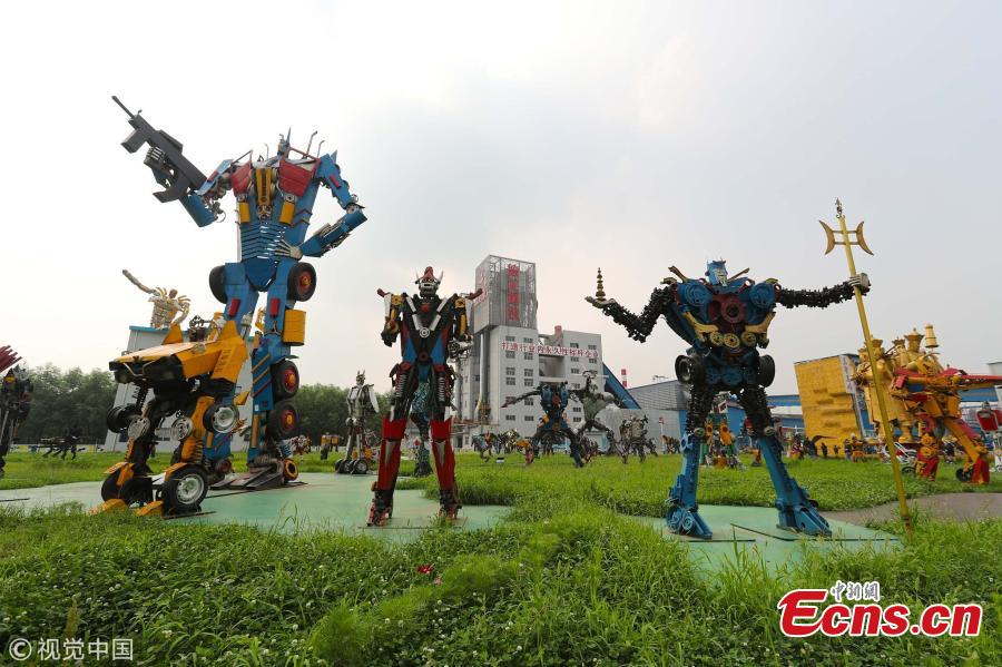 Transformer models made of steel are on display in a steel company in Xingtai City, North China’s Hebei Province, Aug. 1, 2018. The company’s park has 215 robot models of various styles and sizes, from 10.8 to 1.2 meters tall. Some weigh 25 kilograms and others, 11 tons. All the robot models were made by the company’s employees out of used components. The London-based World Record Certification said the company has the world’s largest collection of robot models. (Photo/VCG)