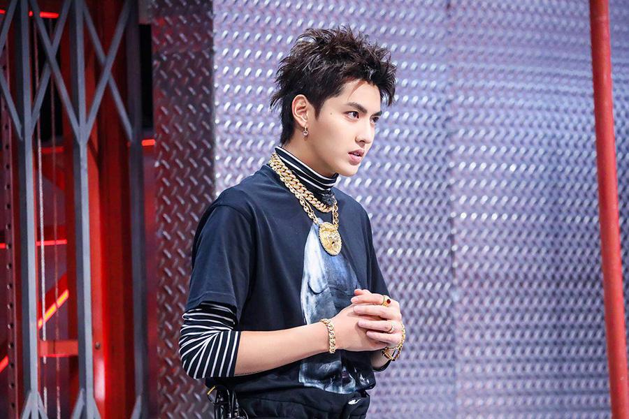<?php echo strip_tags(addslashes(Singer-songwriter Kris Wu performs his song Young OG, combining traditional Chinese musical instruments with hip hop music, at the season 2 of the The Rap of China, a reality show on hip-hop by streaming media platform iQiyi. (Photo provided to China Daily))) ?>