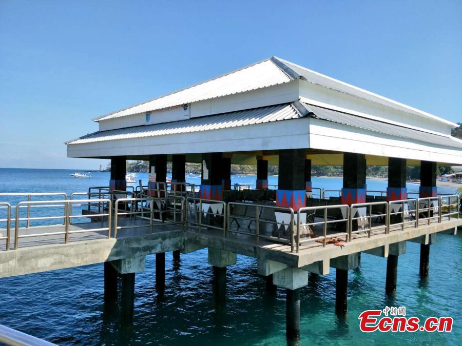 <?php echo strip_tags(addslashes(Photo taken on Aug. 7 shows an empty pier to Gili Island, Indonesia after a 7.0-magnitude earthquake hit the Lombok Island on Aug. 5, 2018. At least  98 people were killed and more than 230 others injured by the strong earthquake.(Photo: China News Service/Lin Yongchuan))) ?>