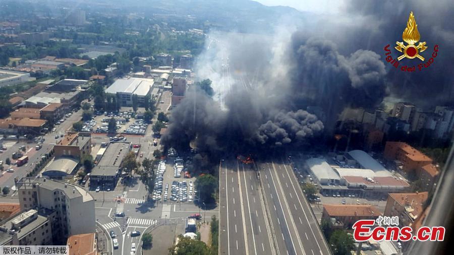 This photo released by the Italian firefighters shows a helicopter view of the explosion on a highway in the outskirts of Bologna, Italy, Aug. 6, 2018. The explosion killed at least two people and injured up to 70 as a section of the thoroughfare collapsed, police said. (Photo/Agencies)