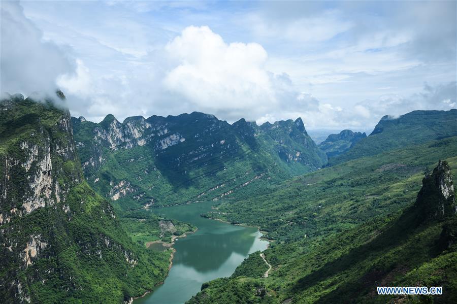 <?php echo strip_tags(addslashes(Photo taken on Aug. 7, 2018 shows the scenery of Beipanjiang river valley in Zhenfeng County, southwest China's Guizhou Province. (Xinhua/Tao Liang))) ?>