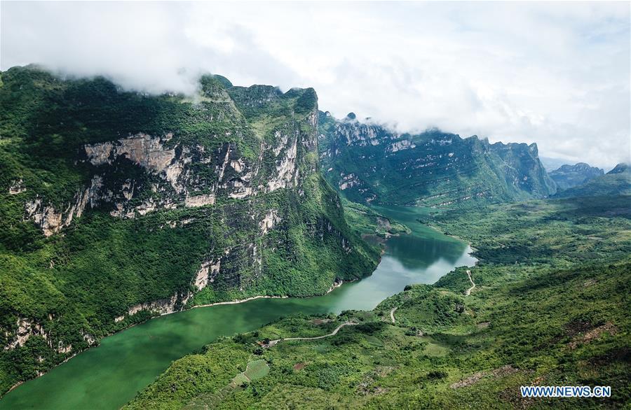 Aerial photo taken on Aug. 7, 2018 shows the scenery of Beipanjiang river valley in Zhenfeng County, southwest China\'s Guizhou Province. (Xinhua/Tao Liang)