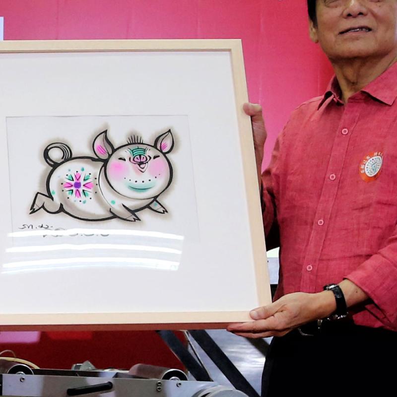 One of the two Year of Pig stamps designed by Han Meilin. (Photo/China Daily)