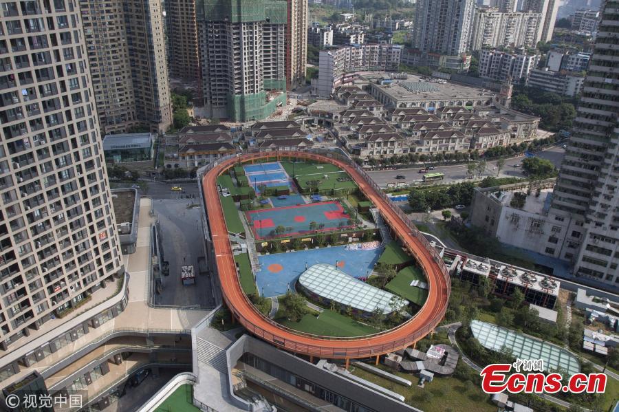 <?php echo strip_tags(addslashes(A sports facility built on top of a shopping mall in Chongqing, Aug. 9, 2018. The 17,000 sqm area includes four table tennis courts, three badminton courts, one standard basketball court and running tracks, all available to the public free of charge. (Photo/VCG))) ?>