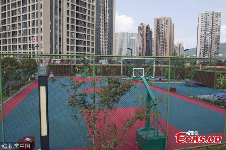 <?php echo strip_tags(addslashes(A sports facility built on top of a shopping mall in Chongqing, Aug. 9, 2018. The 17,000 sqm area includes four table tennis courts, three badminton courts, one standard basketball court and running tracks, all available to the public free of charge. (Photo/VCG))) ?>