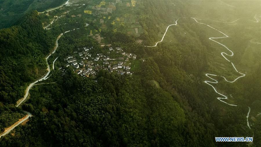 <?php echo strip_tags(addslashes(Aerial photo taken on Aug. 10, 2018 shows scenery at dawn in Shitan Village, Shexian County, east China's Anhui Province. (Xinhua/Zhang Duan))) ?>