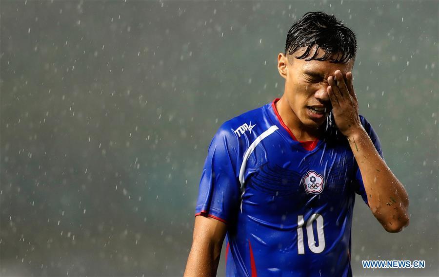 Chen Chaoan of Chinese Taipei reacts during the Men\'s Football Group A match between Chinese Taipei and Palestine at the 18th Asian Games at Patriot Stadium in Bekasi, Indonesia, Aug. 10, 2018. (Xinhua/Wang Lili)
