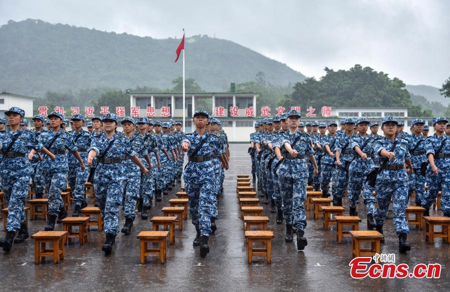 Graduation ceremony is held at a military camp for Hong Kong\'s university students, PLA Hong Kong garrison, Aug. 12, 2018. (Photo: China News Service/Zhang Wei)