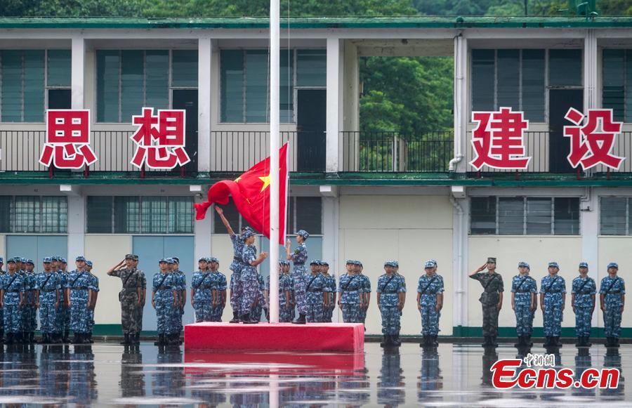 Graduation ceremony is held at a military camp for Hong Kong\'s university students, PLA Hong Kong garrison, Aug. 12, 2018. (Photo: China News Service/Zhang Wei)